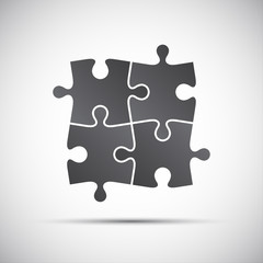 Simple vector illustration of a four pieces puzzle