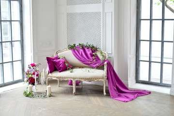 sofa decorating with flowers and cloth
