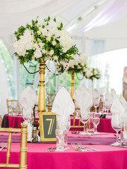 Wedding table with the sign number seven