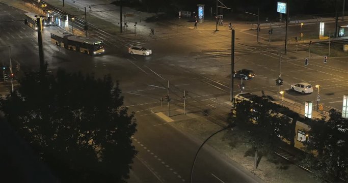 Slow motion traffic junction with trams and cars, Berlin, Germany