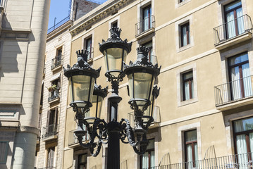Fototapeta na wymiar Classic lamppost in Les Rambles of Barcelona