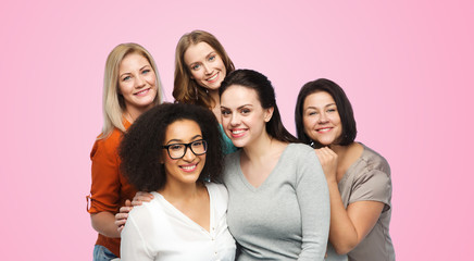 group of happy different women in casual clothes