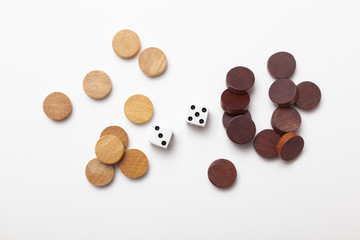 2 dice and wood chess on white background
