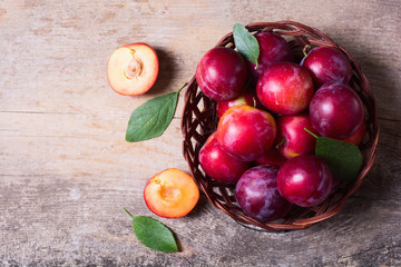 plums in basket