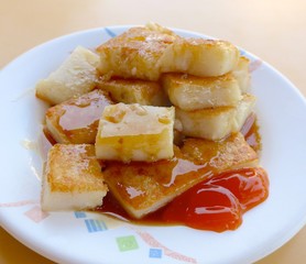 Radish cake closeup with sauce in Taiwan