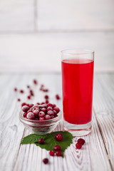Cranberry juice glass red