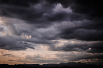 Naklejka na ściany i meble Dark Sky ,Storm cloud before rain over the mountains.
