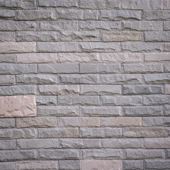 gray rock brick wall texture and background