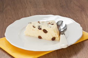 Cottage cheese souffle / Delicious cottage cheese souffle with raisins on white plate