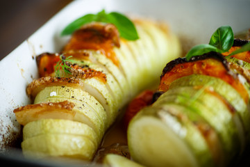 Baked zucchini stuffed with vegetables