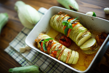 Baked zucchini stuffed with vegetables