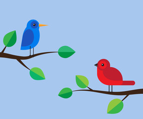 Blue and red birds on a branches
