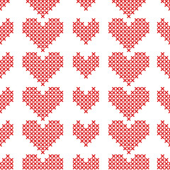 Seamless pattern with cross-stitch hearts on white background.