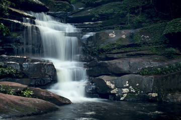 Fototapeta premium beautiful waterfall with dark toned, vignette corner
