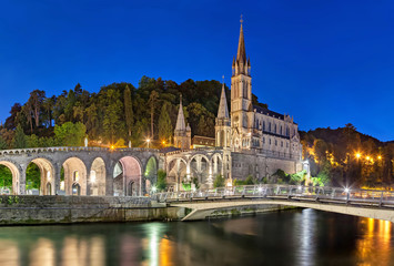 Rosary Basilica at night in Lourdes