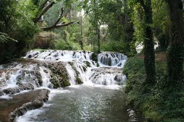 Tuinposter Watervallen Cascada en el Rio Piedra (parque natural del Monasterio de Piedra) - España  © mmadrigal70