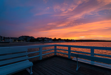 Fototapeta na wymiar Sunset on the pier in Sopot, near Gdansk