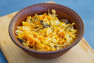 braised cabbage in a wooden bowl