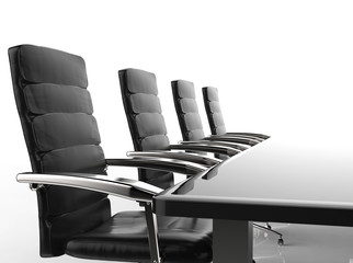 empty conference table and office chairs