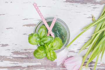 Green smoothie and tulips 