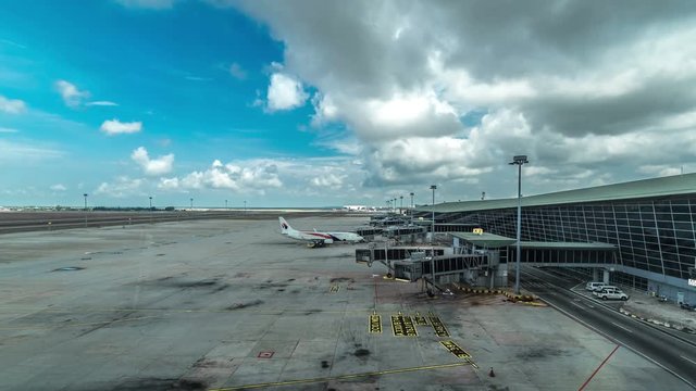 Planes preparing for boarding at Kuala Lumpur International Airport - KLIA. 4K Timelapse - Kuala Lumpur, Malaysia, June 2016.