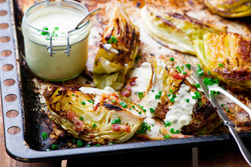 Grilled cabbage  with  cheese sauce.