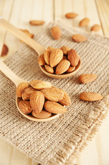 Almond in wooden spoon