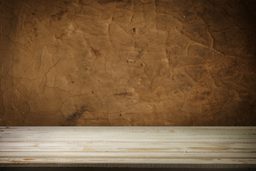 Beer barrel with beer glass on table on wooden background