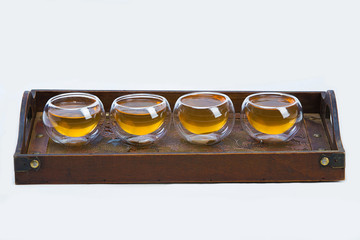 Four Transparent cup of tea on the tea table