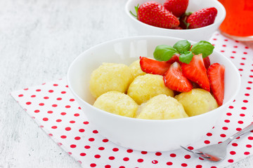 Healthy dessert - dumplings with cheese and strawberry