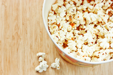 Popcorn on wooden background