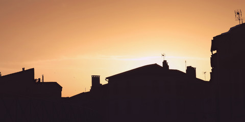 Obraz premium sunset on french small town 