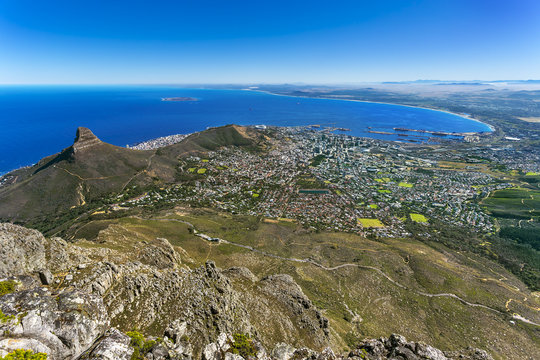 Republic of South Africa. Cape Town (Kaapstad). Panoramic ocean view of the city, Lion's Head, Signal Hill and Robben Island in the background