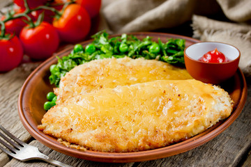 Chicken schnitzel with cheese crust for dinner