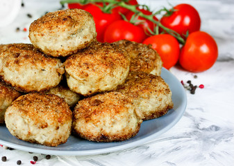 Homemade fried meatballs with pepper mix and cherry tomatoes