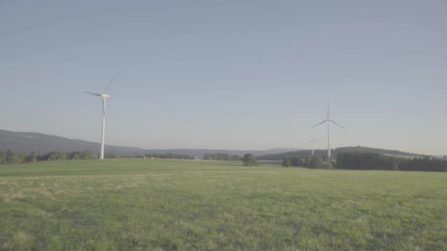 Wind mill for renewable and ecological electricity production - sLog3 raw footage with camera movement without correction