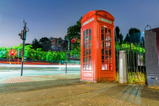 Traditional british phone box at night