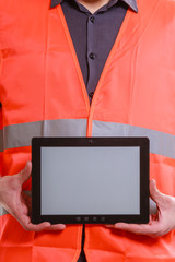 Male worker with tablet.