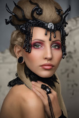 Beautiful girl with a gothic image