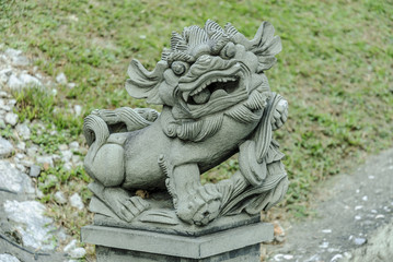 lion in the entry of a Chinese temple in kuala lumpur, Malaysia