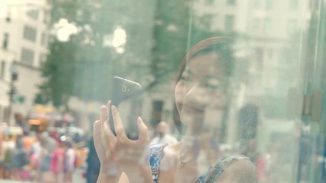 lifestyle portrait of young cute asian women looking at camera. city people view
