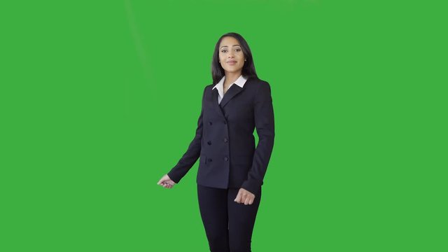 attractive black women in business suit isolated on green screen background