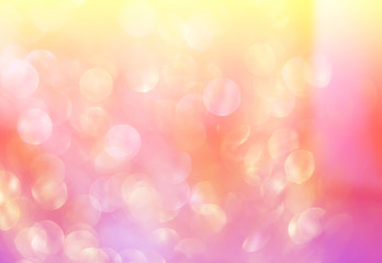 Abstract photo of backlight reflector and glitter bokeh lights background. Image is blurred and made with colorful filters.