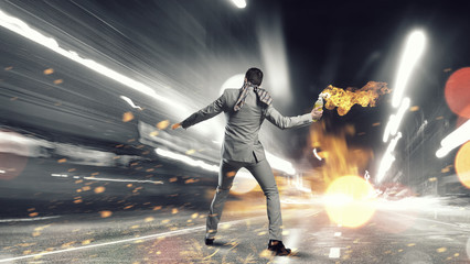 Businessman throwing petrol bomb  . Mixed media