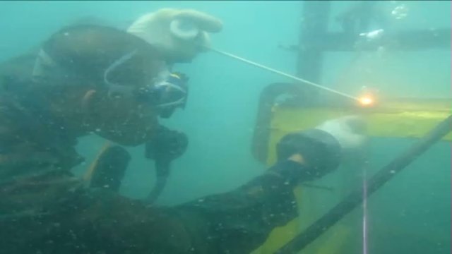 The man welding underwater 