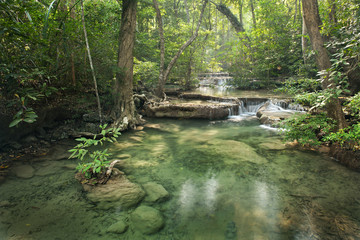 Obraz premium waterfall in deep forest on mountain