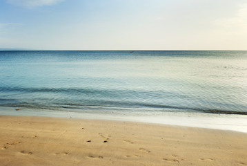 Fototapeta premium sand beach and peaceful waves
