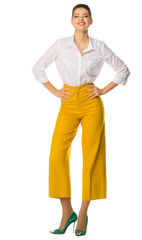 Young woman in yellow pants