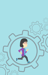 Business woman running inside the gear.