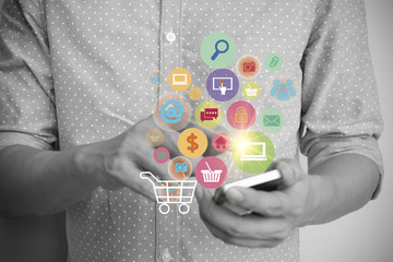 business man are using shopping cart with application software i